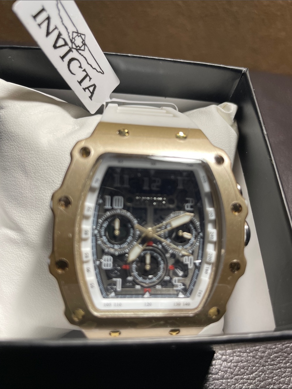 Invicta Gold and White Chronograph Watch with Black Dial